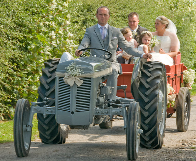 wedding tractor arrival